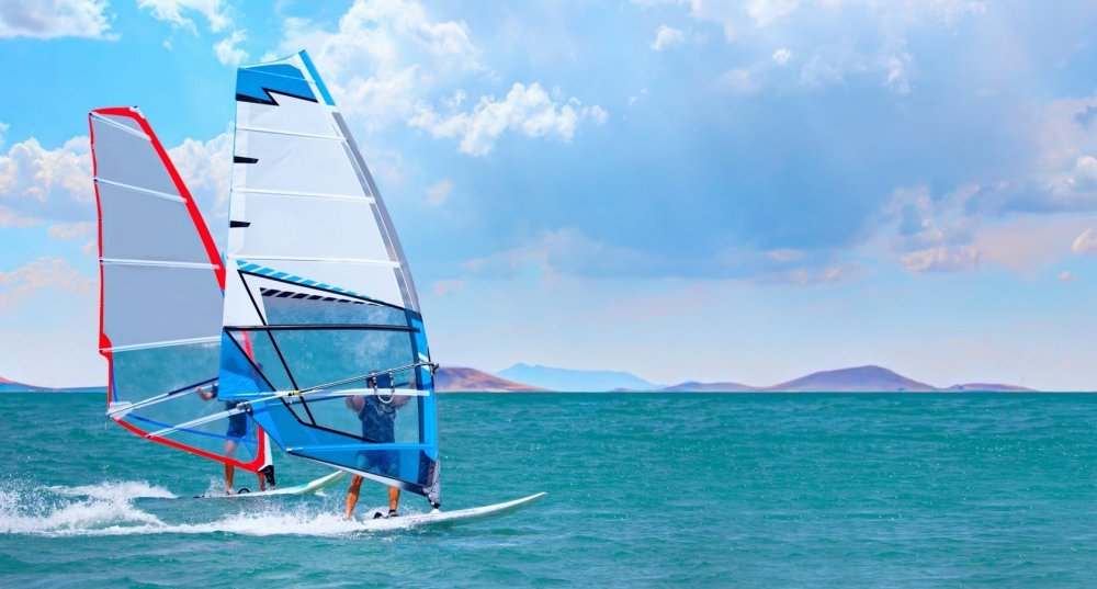Windsurfing. Catch the wind and rush!