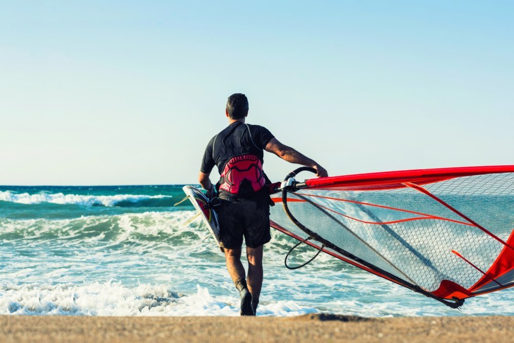 Windsurfing. Catch the wind and rush!